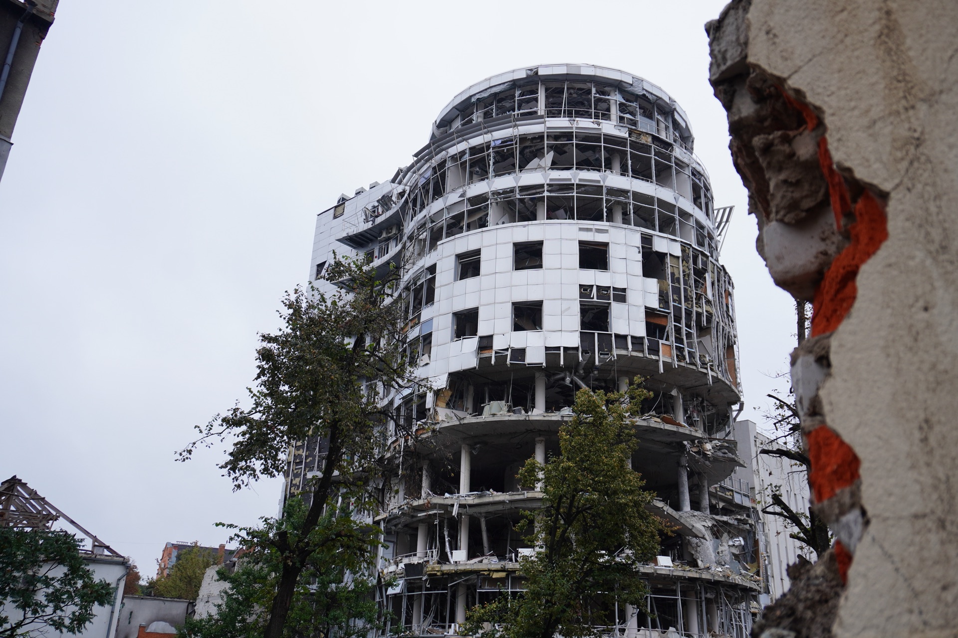A bombed multi-story building with shattered windows, Kharkiv, September 2022